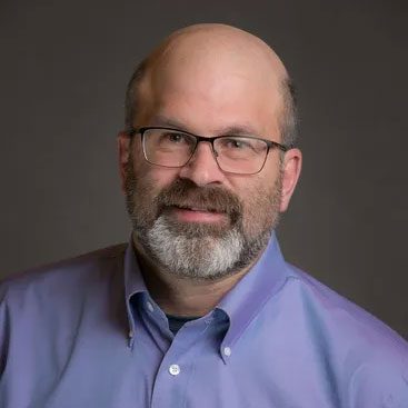terry pettey dvm smiling for a professional photo